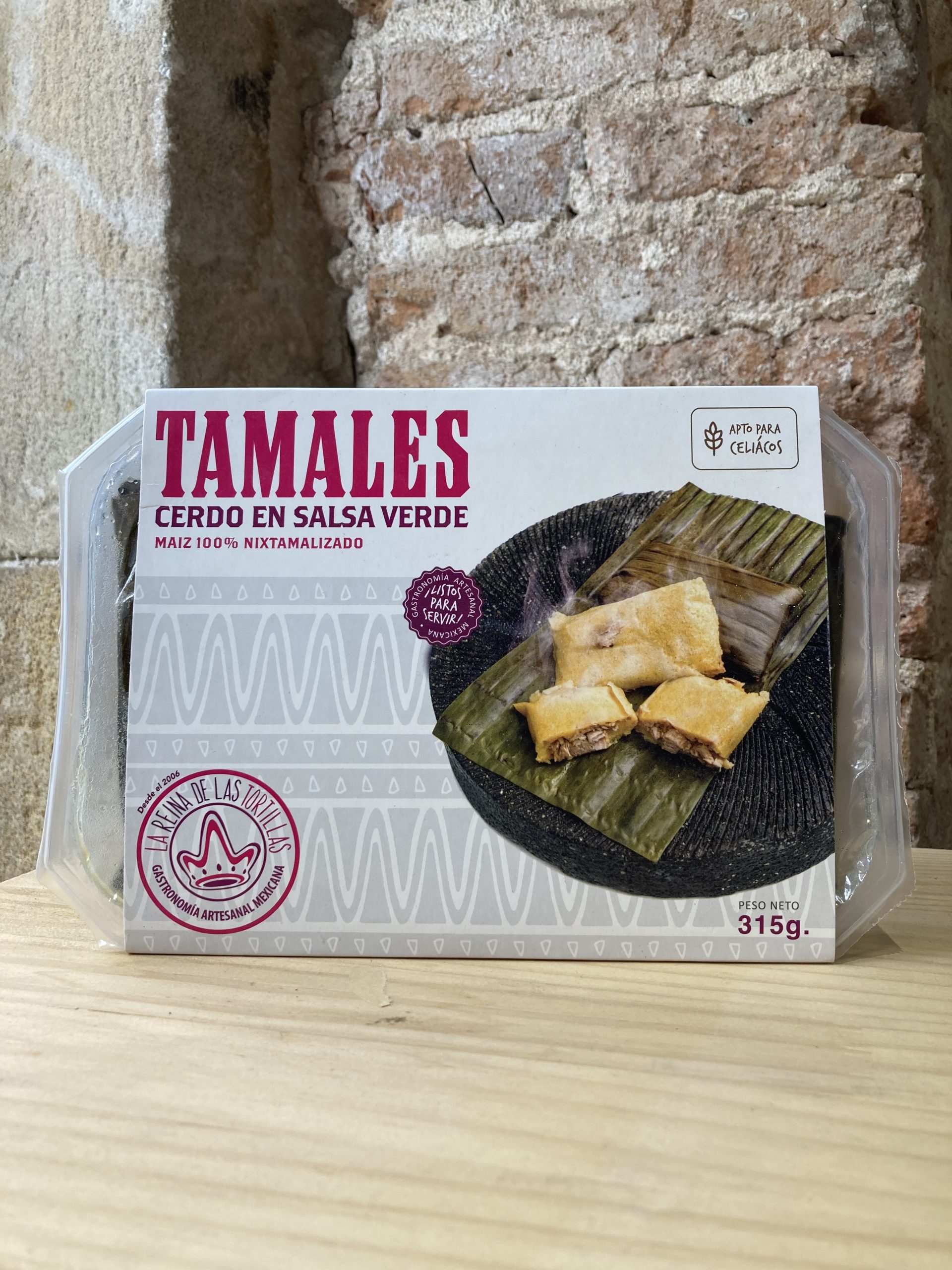 Tamales de cerdo en salsa verde listos para servir de La Reina de las tortillas